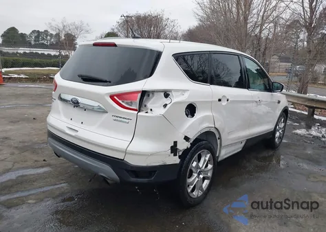 2015 Ford Escape Titanium z USA, uszkodzony, nr VIN 1FMCU0JX6FUB79686